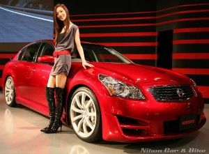 Pretty girl next to her Infiniti G35x AWD